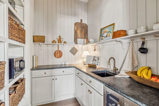 a bathroom with sink and mirror