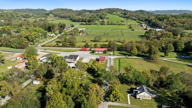 a view of a town with mountains in the background