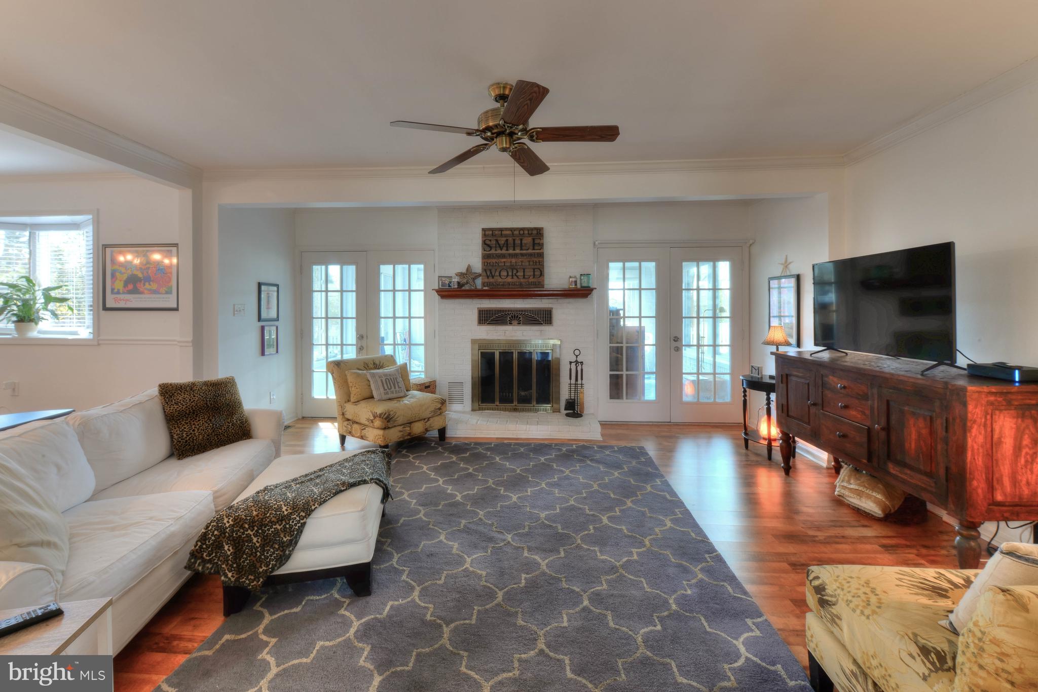 12 Kingsbridge Road Rehoboth Beach, DE 19971 - Photo 4 of 24 Great Room with Wood Burning Fireplace