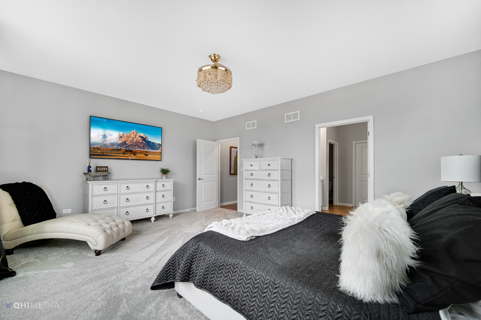 16017 Longcommon Lane Plainfield, IL 60586 - Photo 12 of 22 a bedroom with a bed and a couch