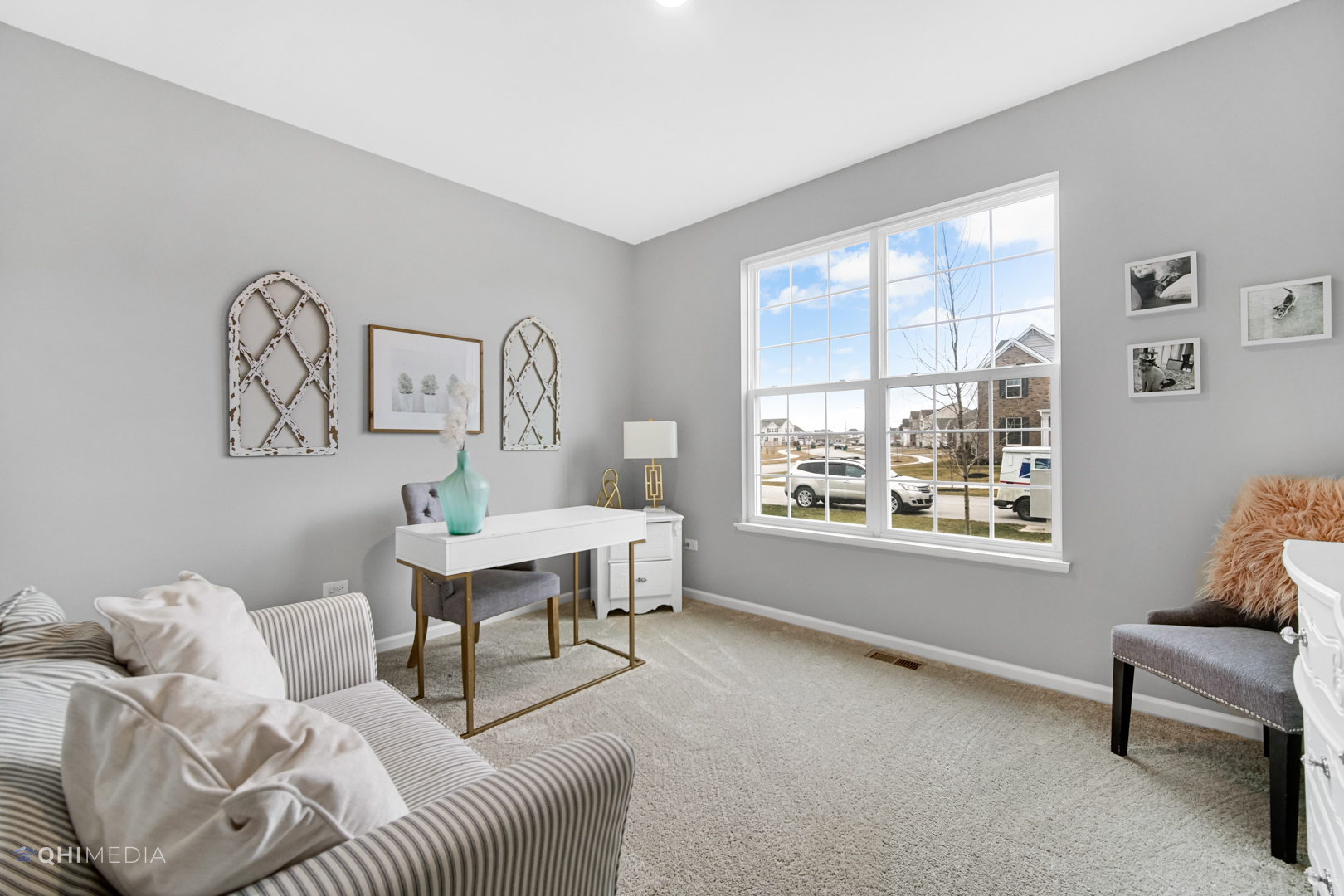 16017 Longcommon Lane Plainfield, IL 60586 - Photo 17 of 22 a living room with furniture and a window
