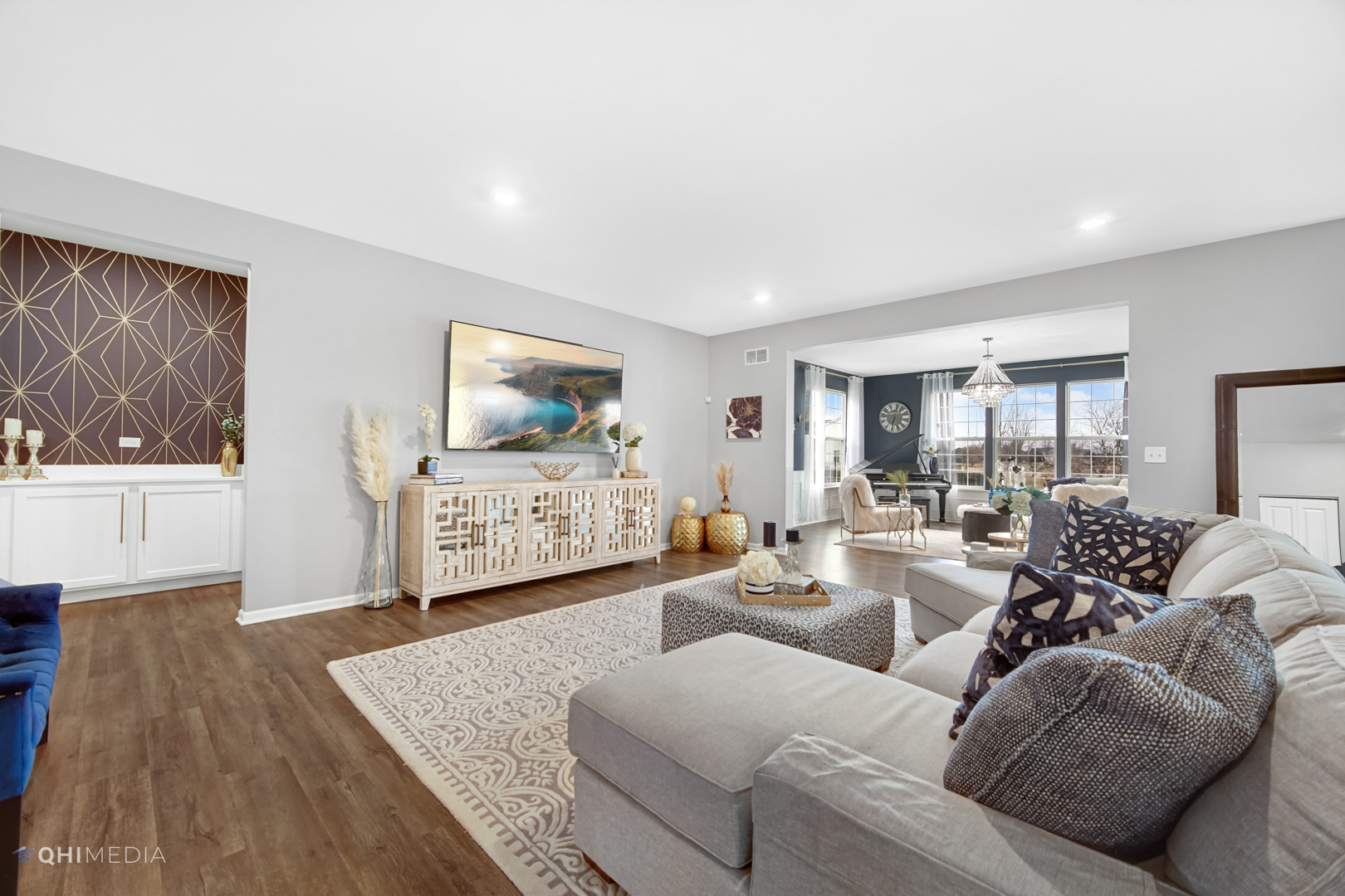 16017 Longcommon Lane Plainfield, IL 60586 - Photo 4 of 22 a living room with furniture and a wooden floor