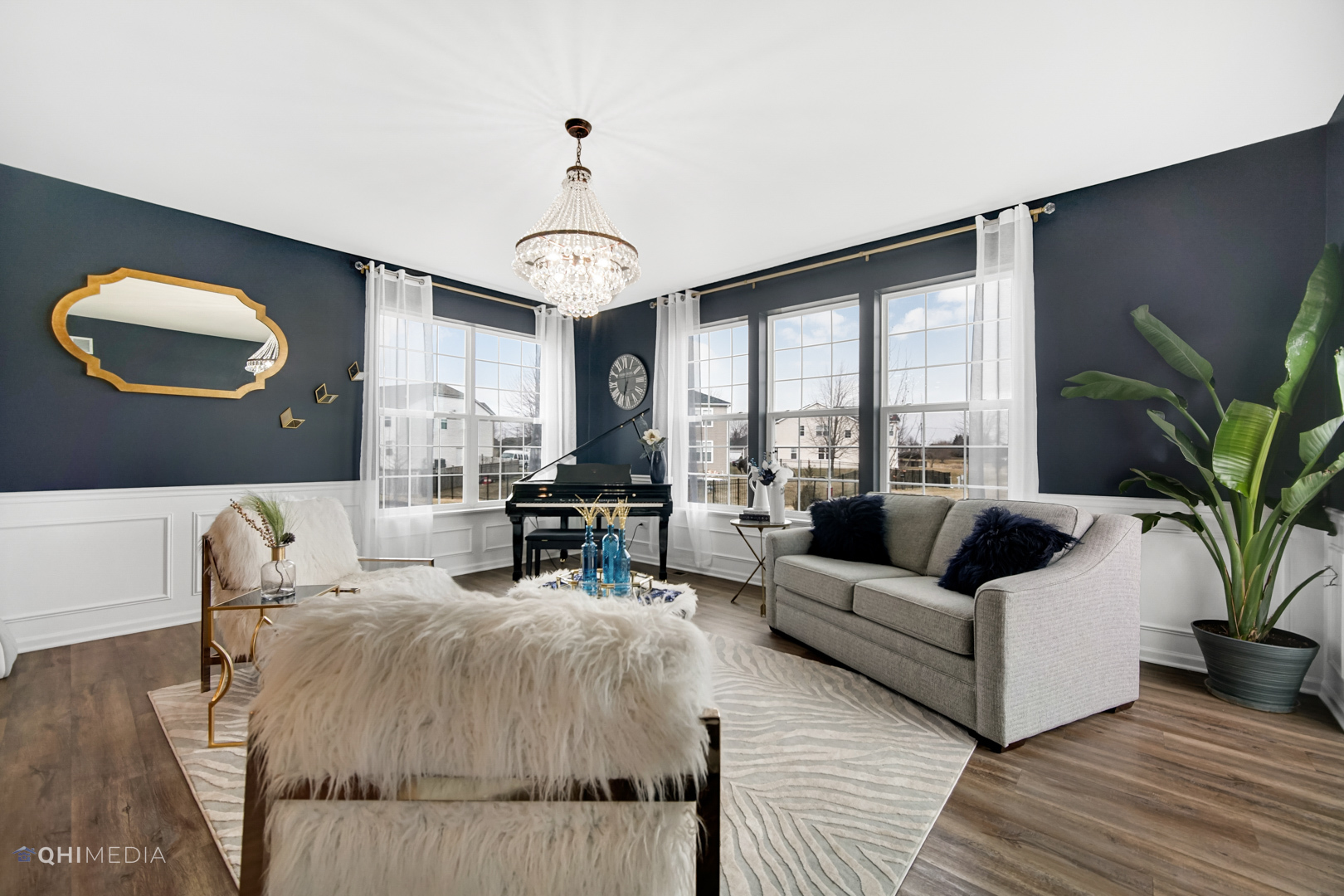 16017 Longcommon Lane Plainfield, IL 60586 - Photo 10 of 22 a living room with furniture and a large window