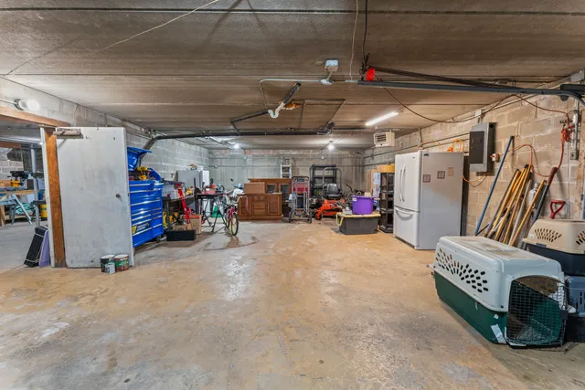 a view of parking garage with cars