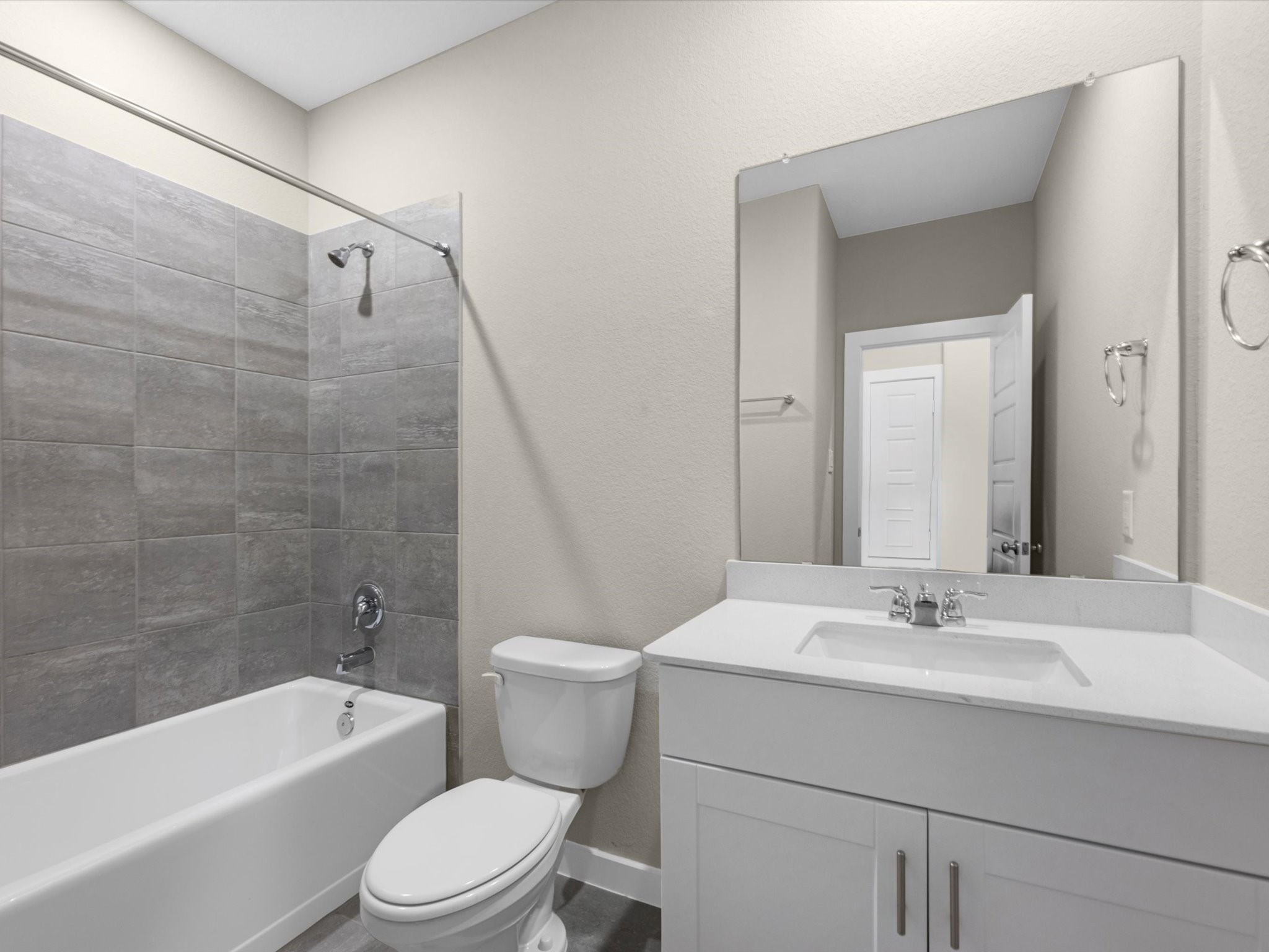 1749 Succotash Oak Court Conroe, TX 77304 - Photo 17 of 21 a bathroom with a sink a toilet and a bathtub