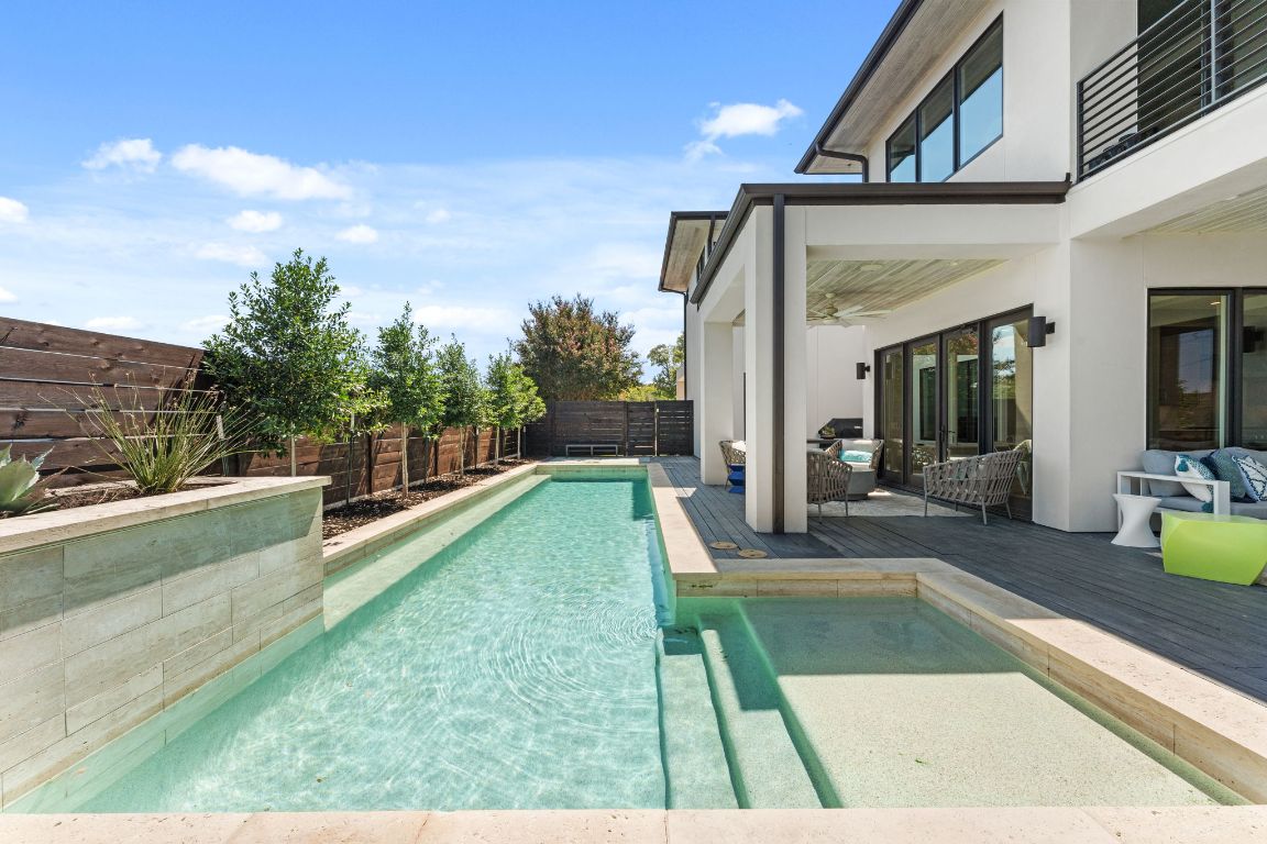 4908 Beverly Skyline Austin, TX 78731 - Photo 33 of 40 View of pool featuring a fenced backyard, a ceiling fan, outdoor lounge area, and a patio area