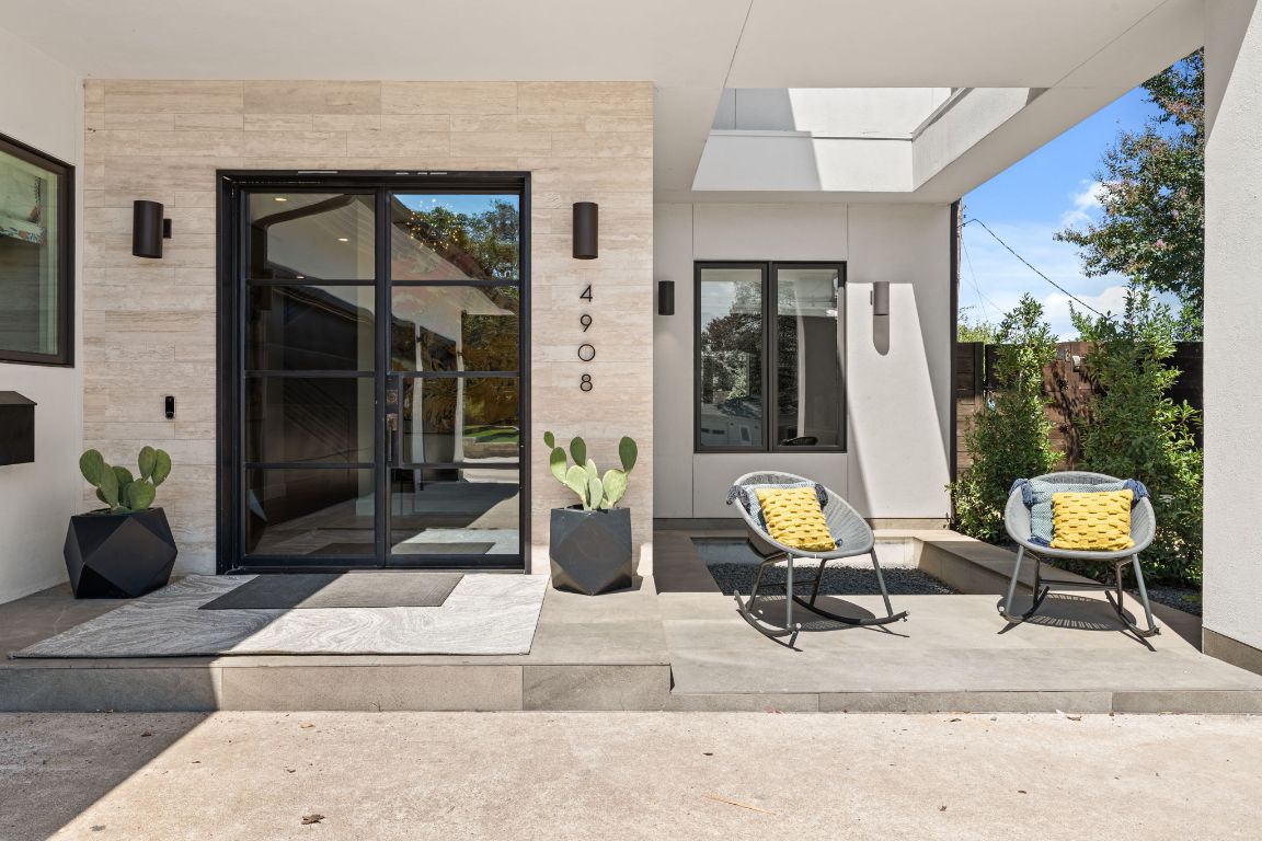 4908 Beverly Skyline Austin, TX 78731 - Photo 38 of 40 Property entrance with a patio
