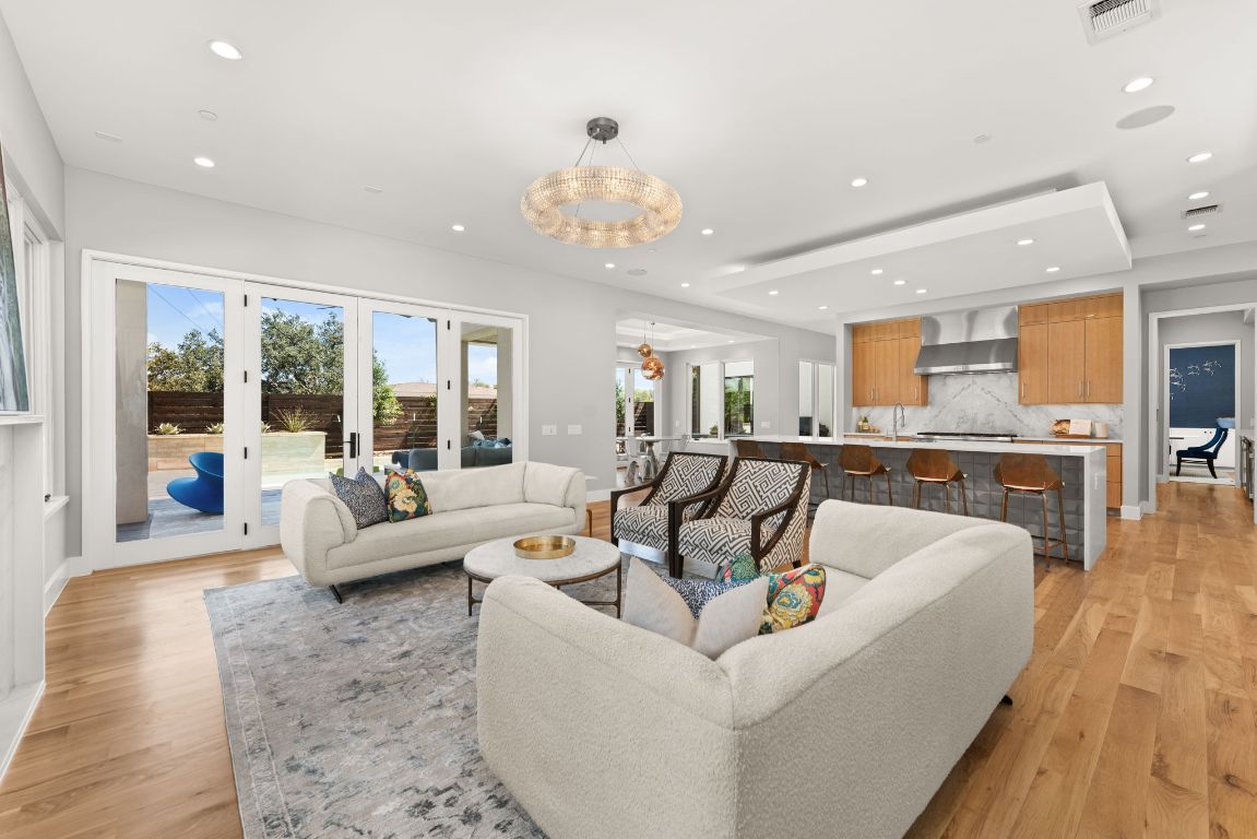 4908 Beverly Skyline Austin, TX 78731 - Photo 9 of 40 Living area featuring recessed lighting and light wood-style flooring