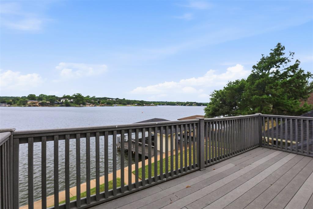 2406 River Road Granbury, TX 76048 - Photo 25 of 40 Outdoor deck featuring wood-finish flooring and a wood-finish railing