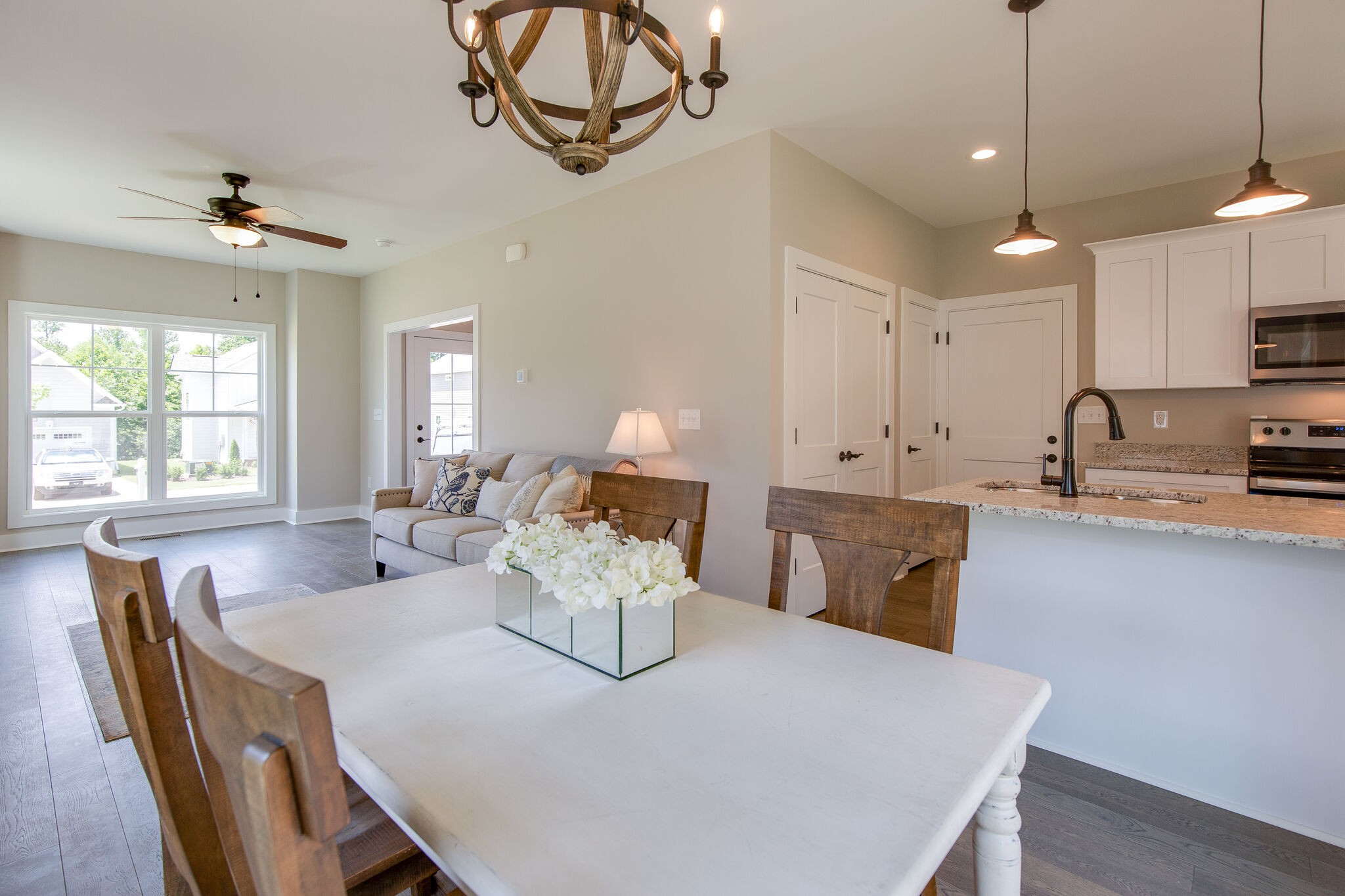 1026 Sycamore Ridge East, Unit 44 Burns, TN 37029 - Photo 13 of 28 a large kitchen with a table and chairs