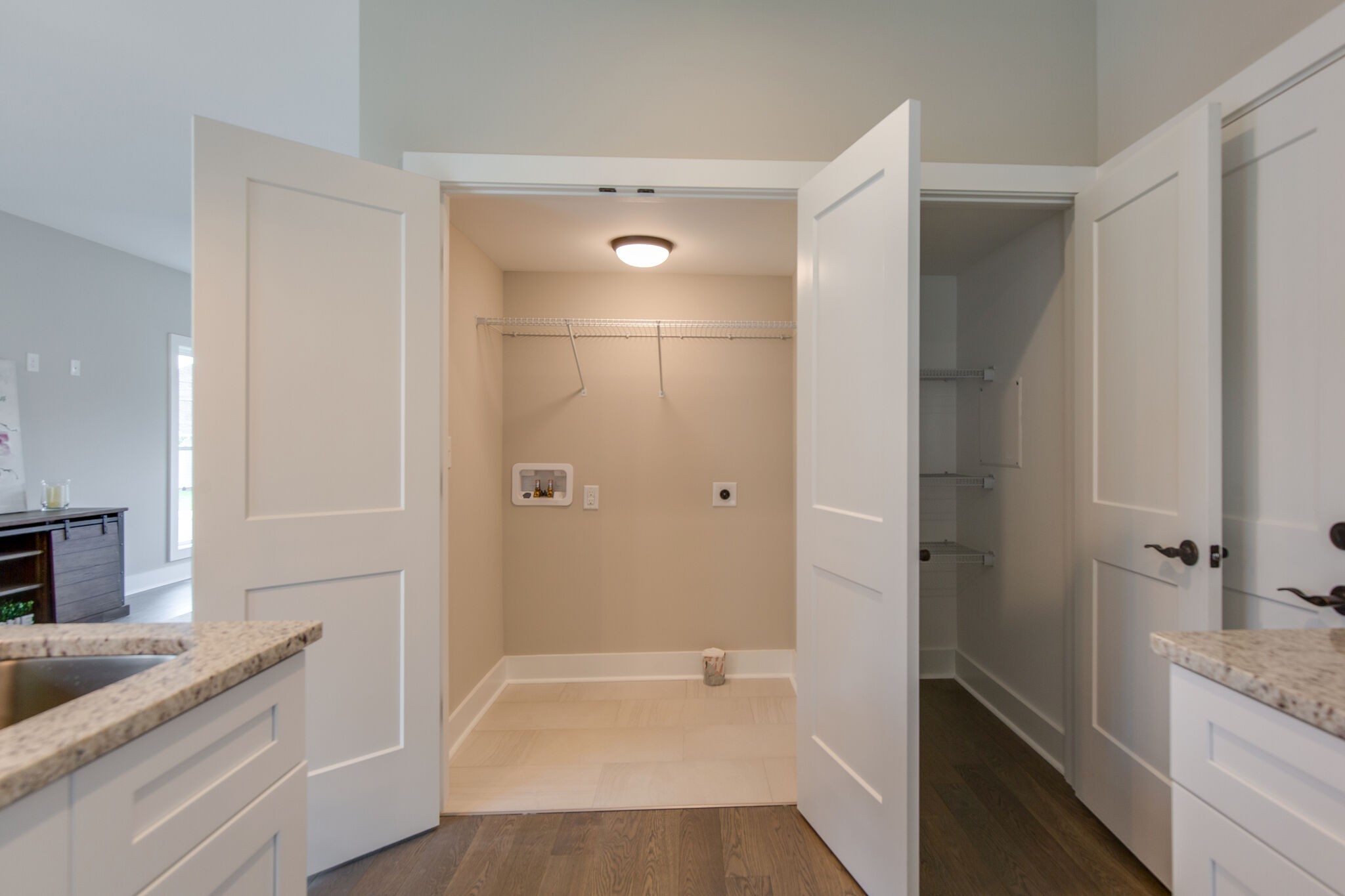 1026 Sycamore Ridge East, Unit 44 Burns, TN 37029 - Photo 16 of 28 a bathroom with a granite countertop sink a toilet and shower