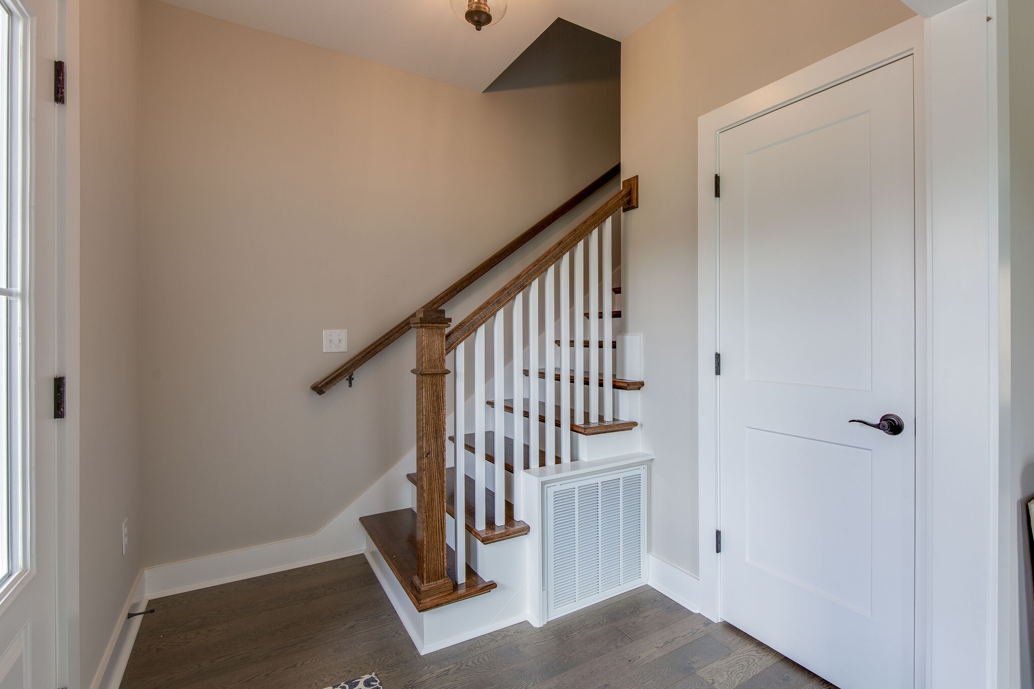 1026 Sycamore Ridge East, Unit 44 Burns, TN 37029 - Photo 19 of 28 a view of entryway with wooden floor and stairs