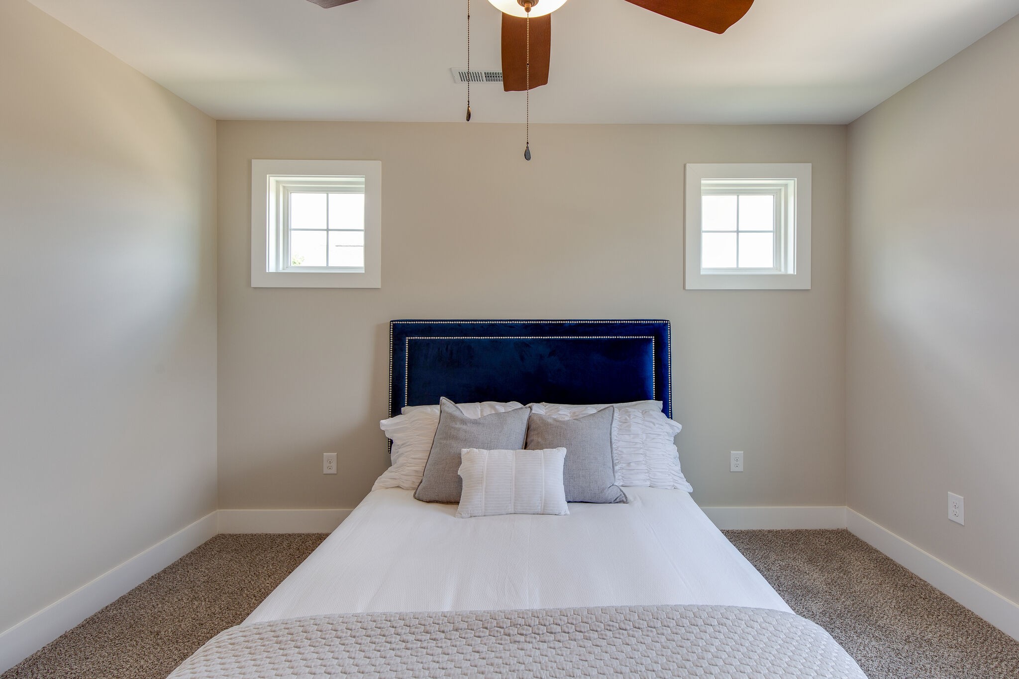 1026 Sycamore Ridge East, Unit 44 Burns, TN 37029 - Photo 21 of 28 a bedroom with a bed and window