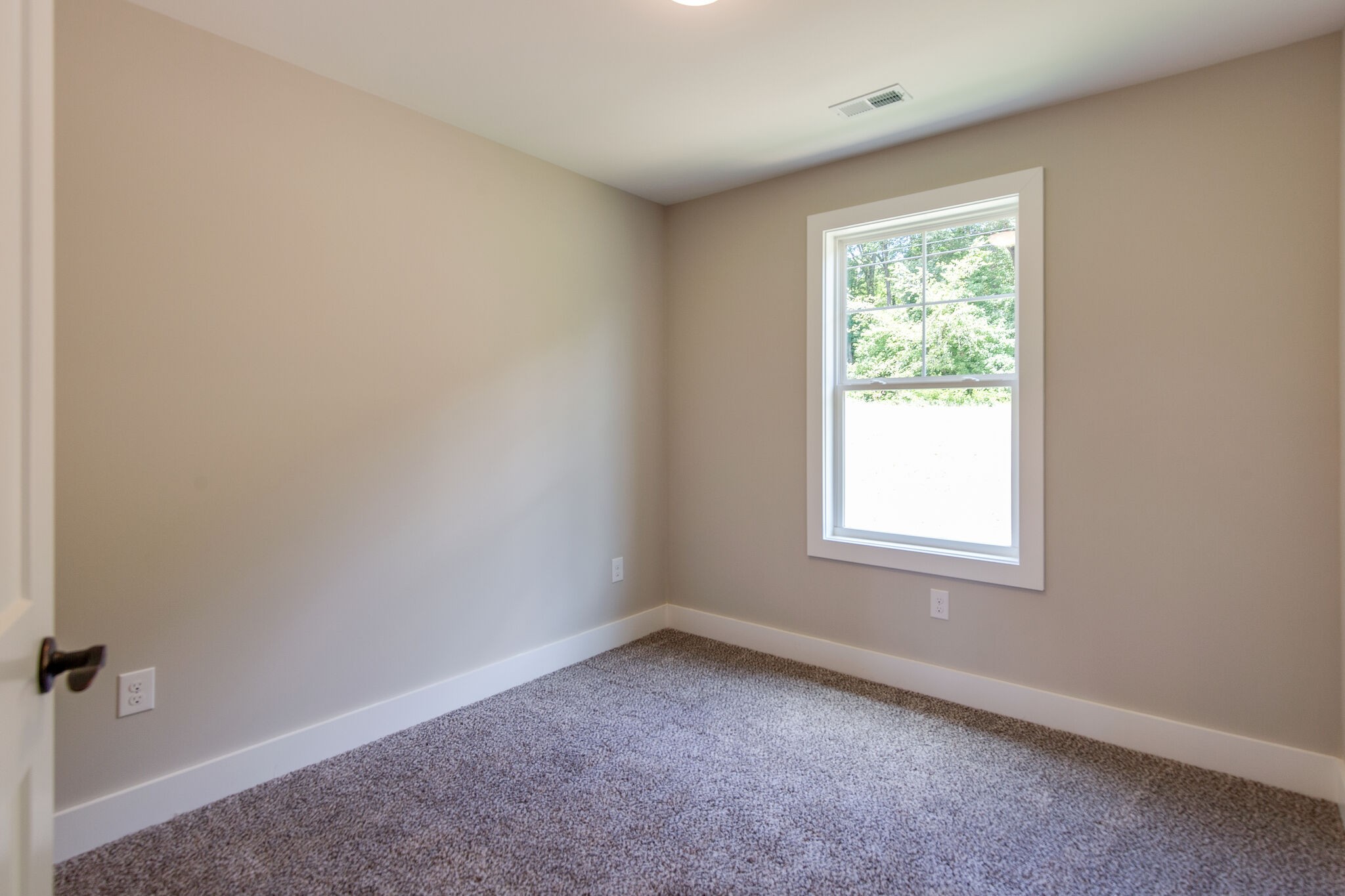 1026 Sycamore Ridge East, Unit 44 Burns, TN 37029 - Photo 26 of 28 an empty room with a window