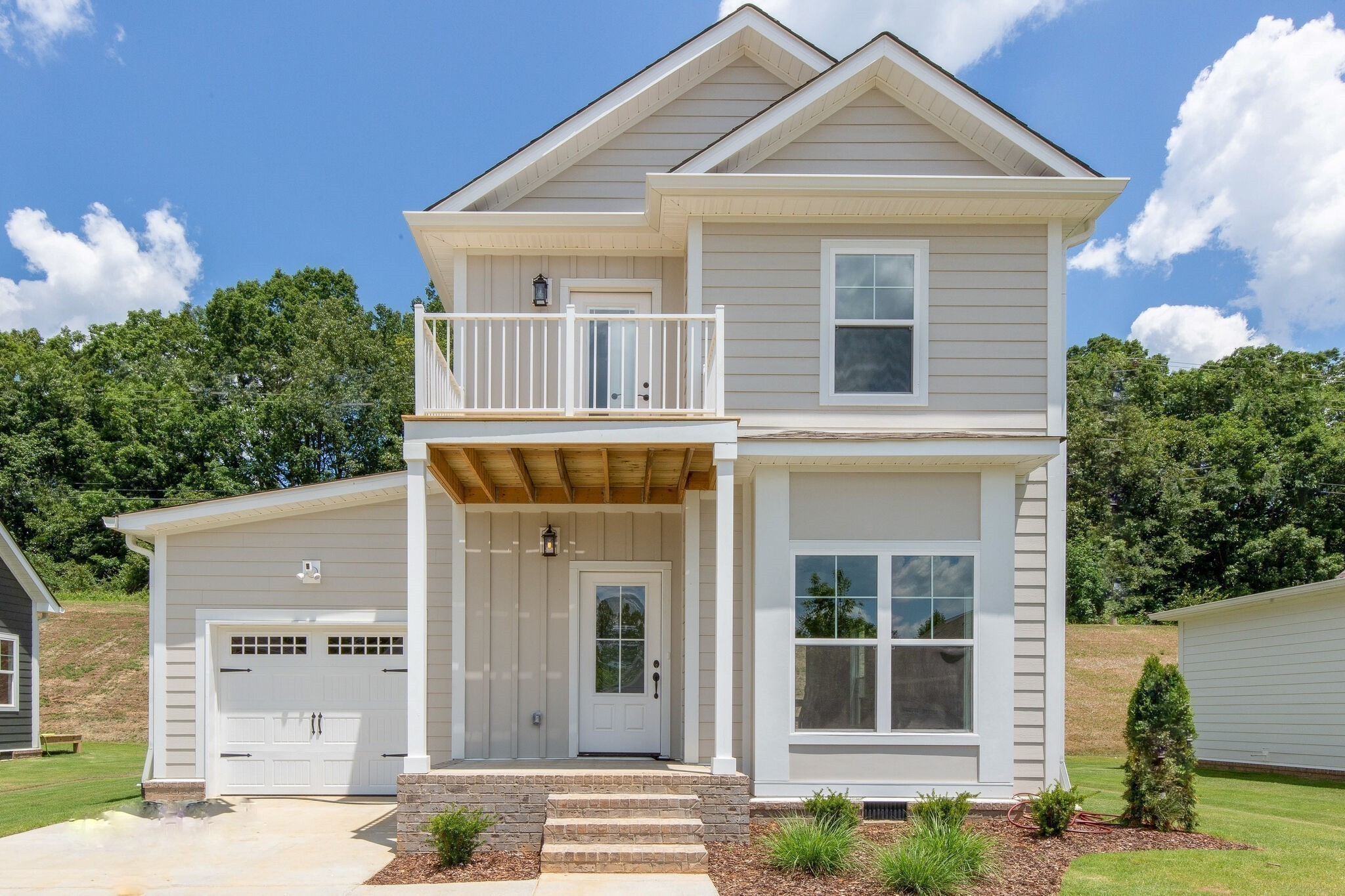 1026 Sycamore Ridge East, Unit 44 Burns, TN 37029 - Photo 8 of 28 a view of a house with a yard