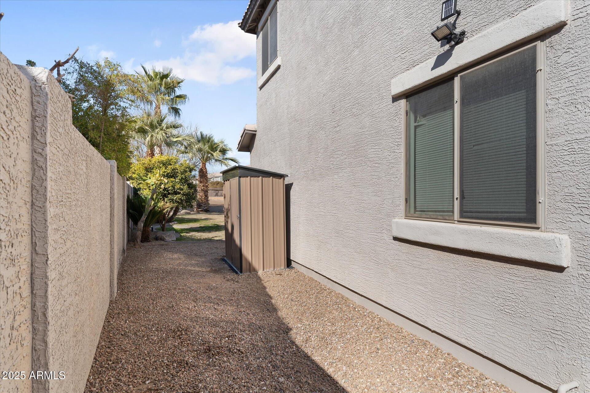 22940 South 213th Street Queen Creek, AZ 85142 - Photo 14 of 52 46-046-sideyard