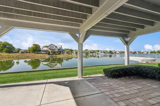 a view of a porch and garden