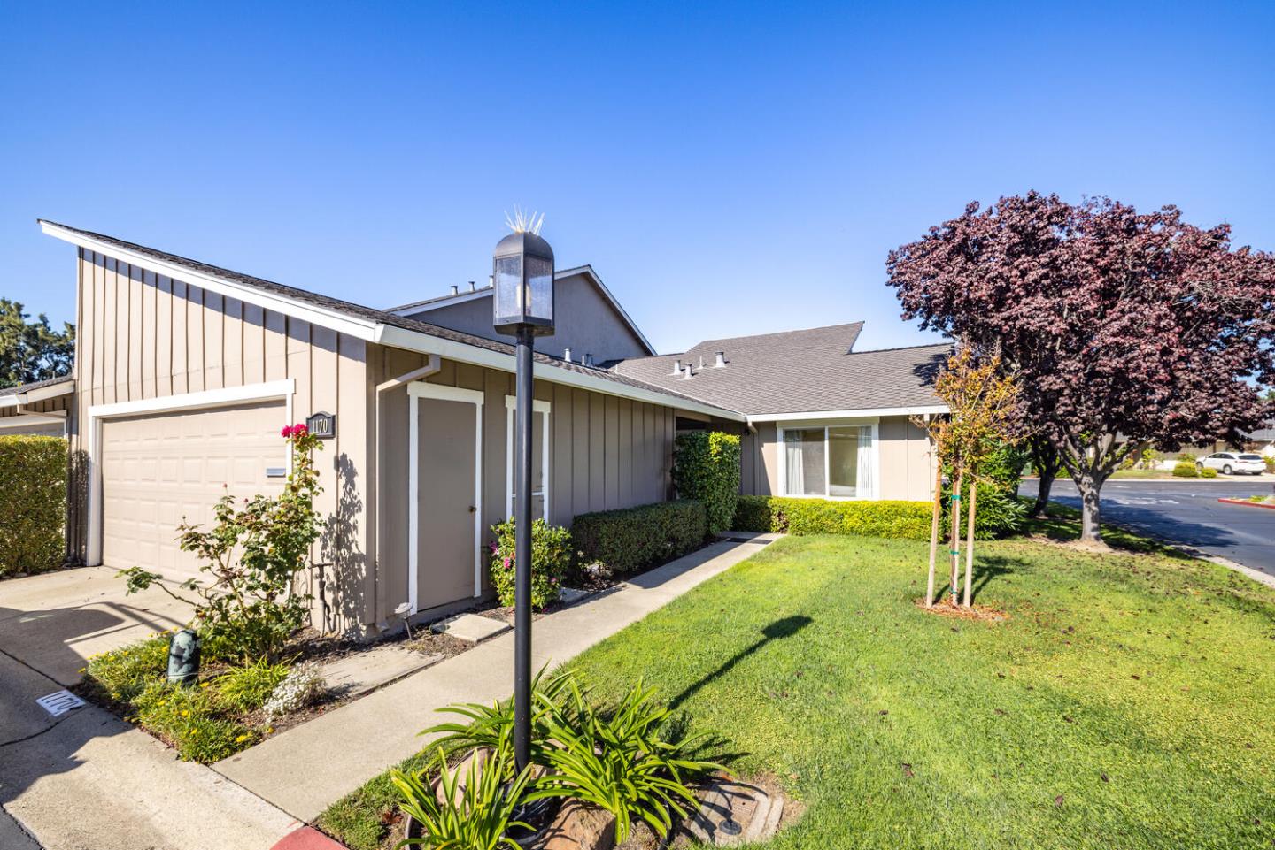 1170 Rickover Lane Foster City, CA 94404 - Photo 1 of 45 a front view of a house with a yard