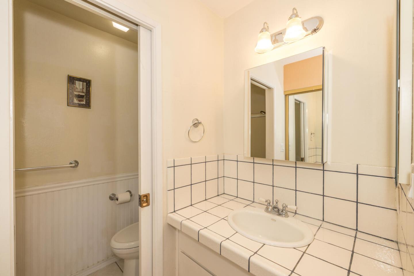 1170 Rickover Lane Foster City, CA 94404 - Photo 23 of 45 a bathroom with a sink toilet and shower