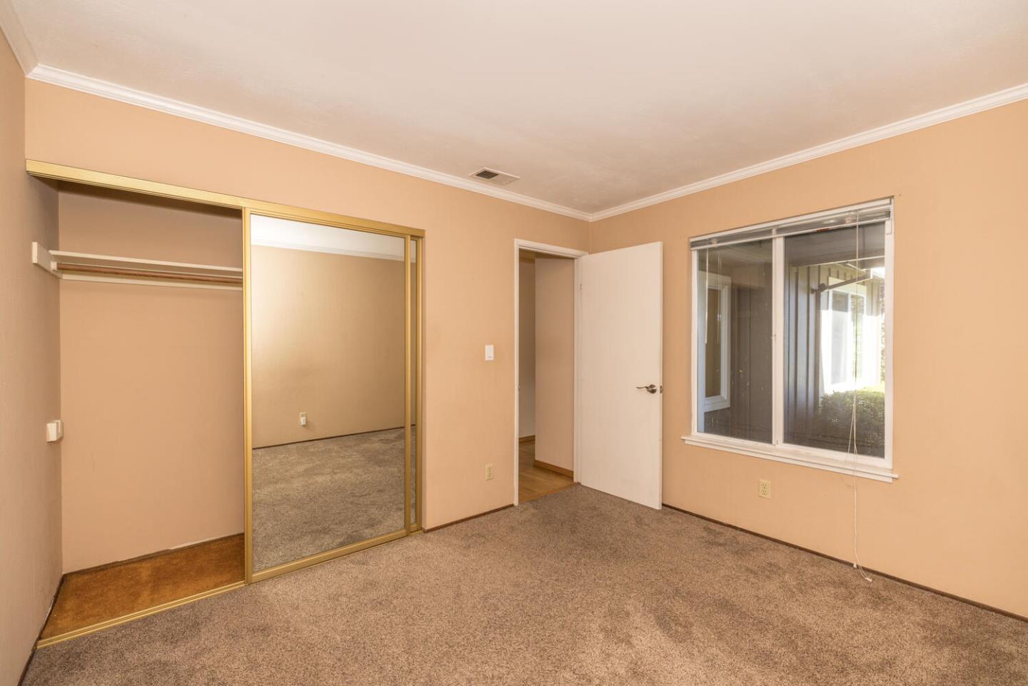 1170 Rickover Lane Foster City, CA 94404 - Photo 28 of 45 an empty room with windows and closet