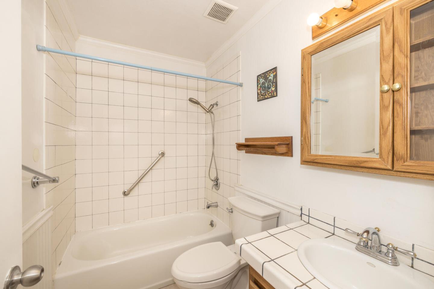 1170 Rickover Lane Foster City, CA 94404 - Photo 29 of 45 a bathroom with a bathtub shower sink vanity and toilet