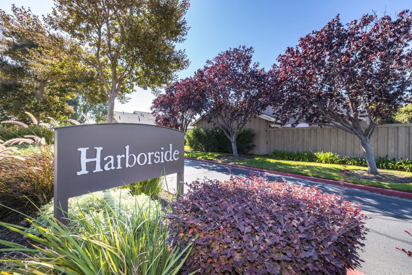 1170 Rickover Lane Foster City, CA 94404 - Photo 38 of 45 a street sign that is sitting in the middle of a park