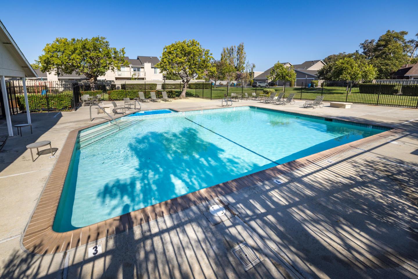 1170 Rickover Lane Foster City, CA 94404 - Photo 44 of 45 a view of a swimming pool with outdoor seating and plants