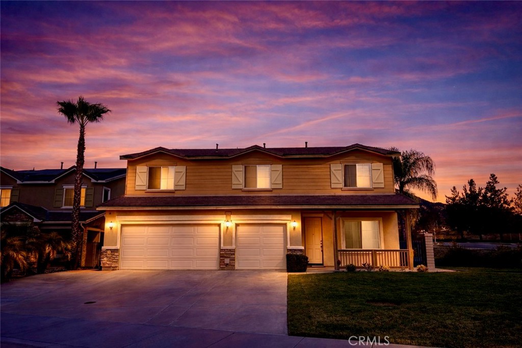 36005 Redgrave Way Murrieta, CA 92562 - Photo 1 of 42 a front view of a house with a yard