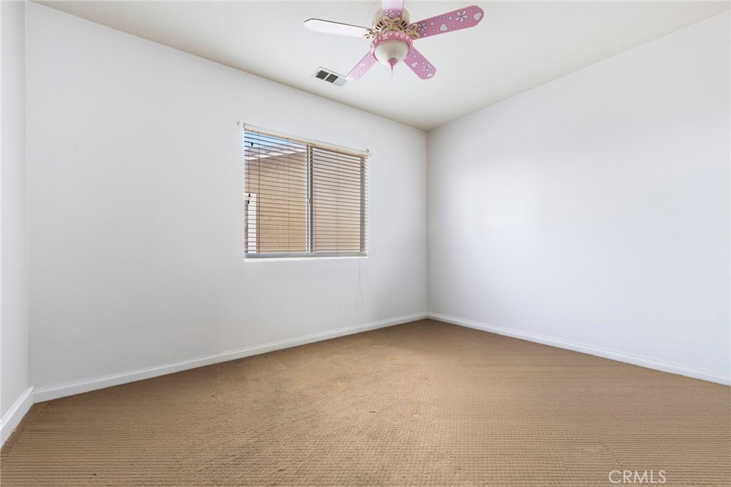36005 Redgrave Way Murrieta, CA 92562 - Photo 19 of 42 an empty room with a window