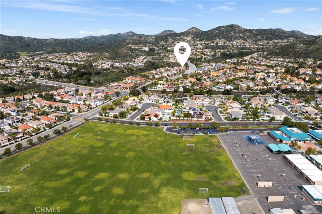 36005 Redgrave Way Murrieta, CA 92562 - Photo 38 of 42 an aerial view of residential houses with outdoor space and trees