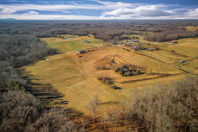 a view of an outdoor space and tennis court