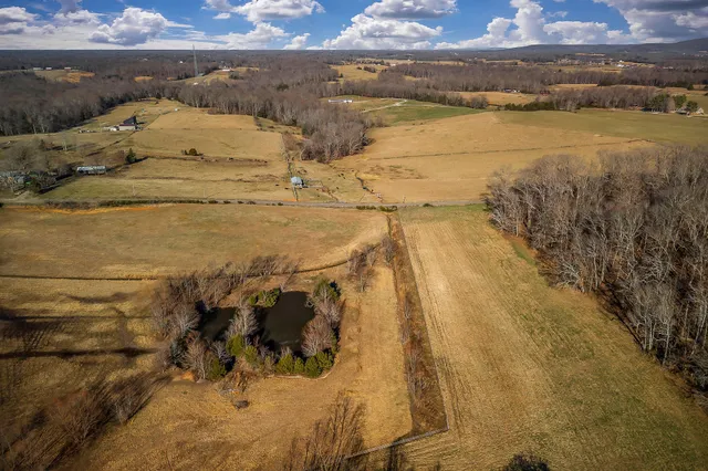 a view of a lake with a yard