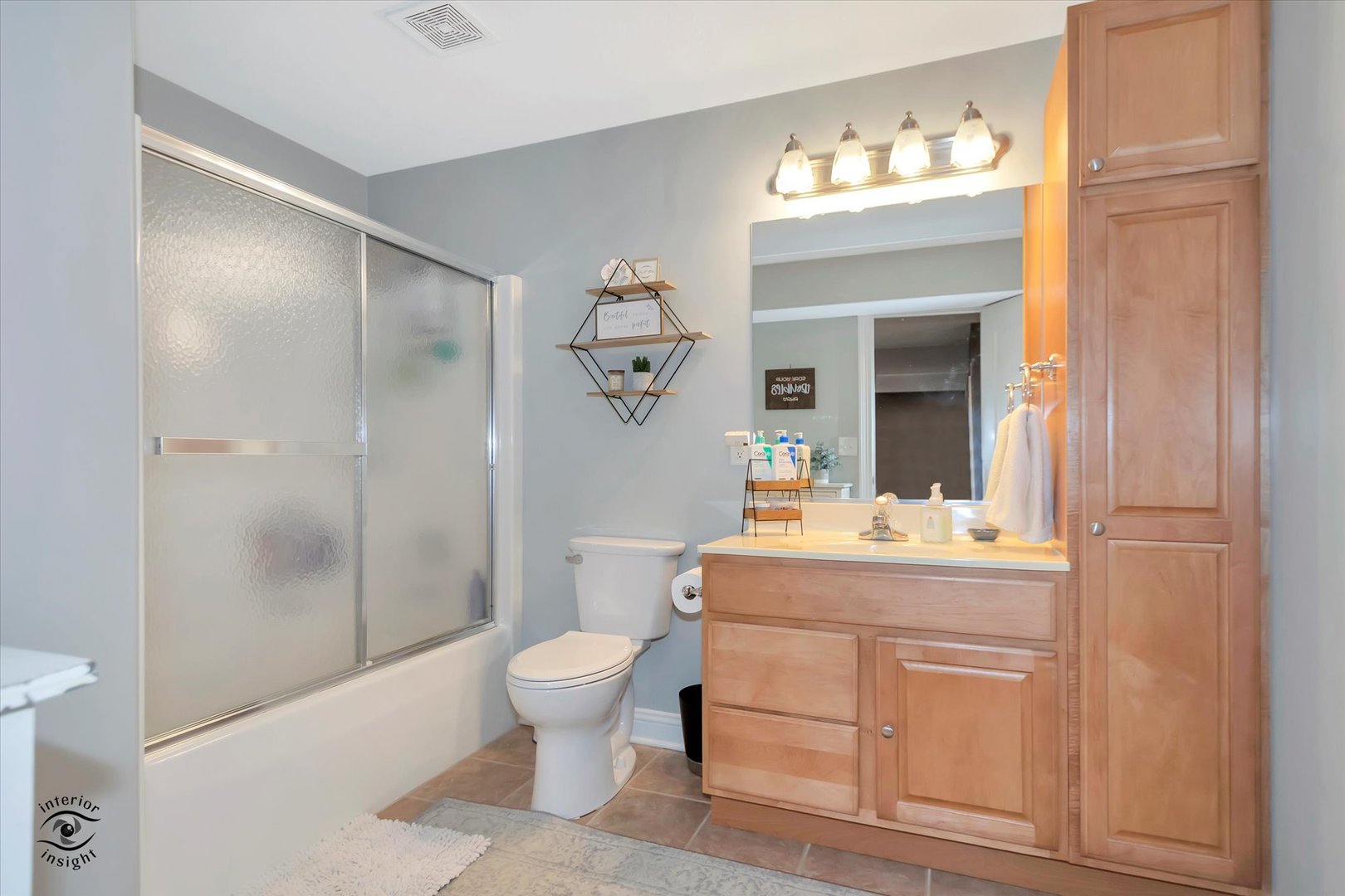 Undisclosed Address Bourbonnais, IL 60914 - Photo 29 of 39 a bathroom with a sink a toilet and shower a mirror