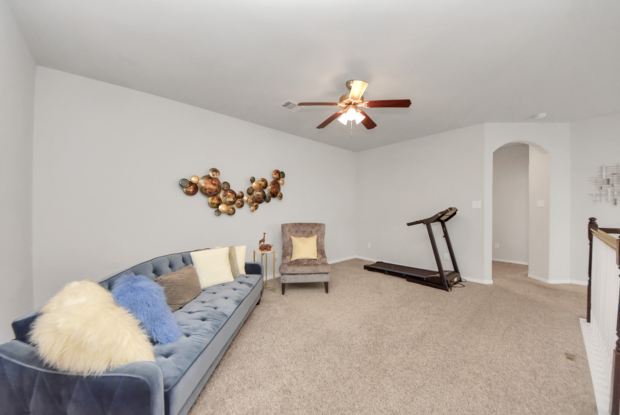 3310 Rainflower Springs Lane Rosenberg, TX 77471 - Photo 24 of 31 A beautifully designed bedroom with plush carpeting, bright lighting, and large windows offering plenty of natural light.