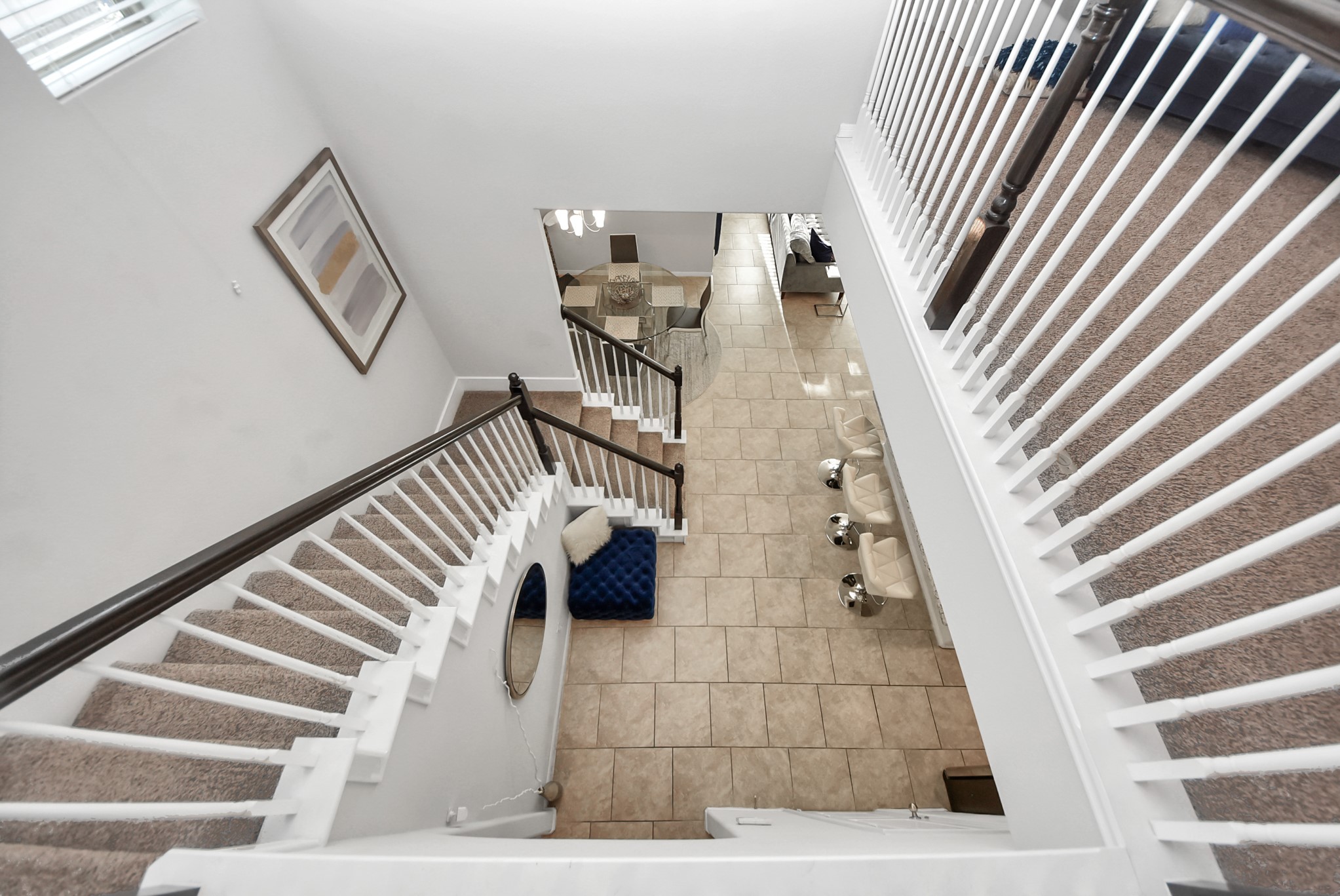 3310 Rainflower Springs Lane Rosenberg, TX 77471 - Photo 27 of 31 A bird's-eye view of the downstairs area with the airy open space and stylish interior design.
