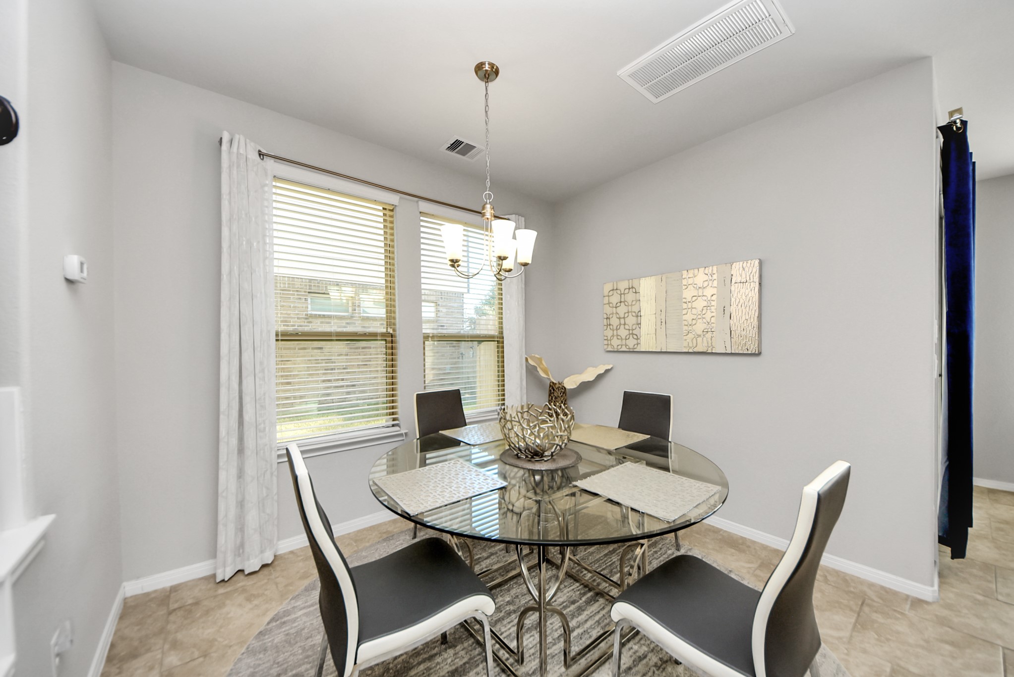 3310 Rainflower Springs Lane Rosenberg, TX 77471 - Photo 8 of 31 Open and airy living space with seamless flow into the kitchen, ideal for family gatherings and socializing.