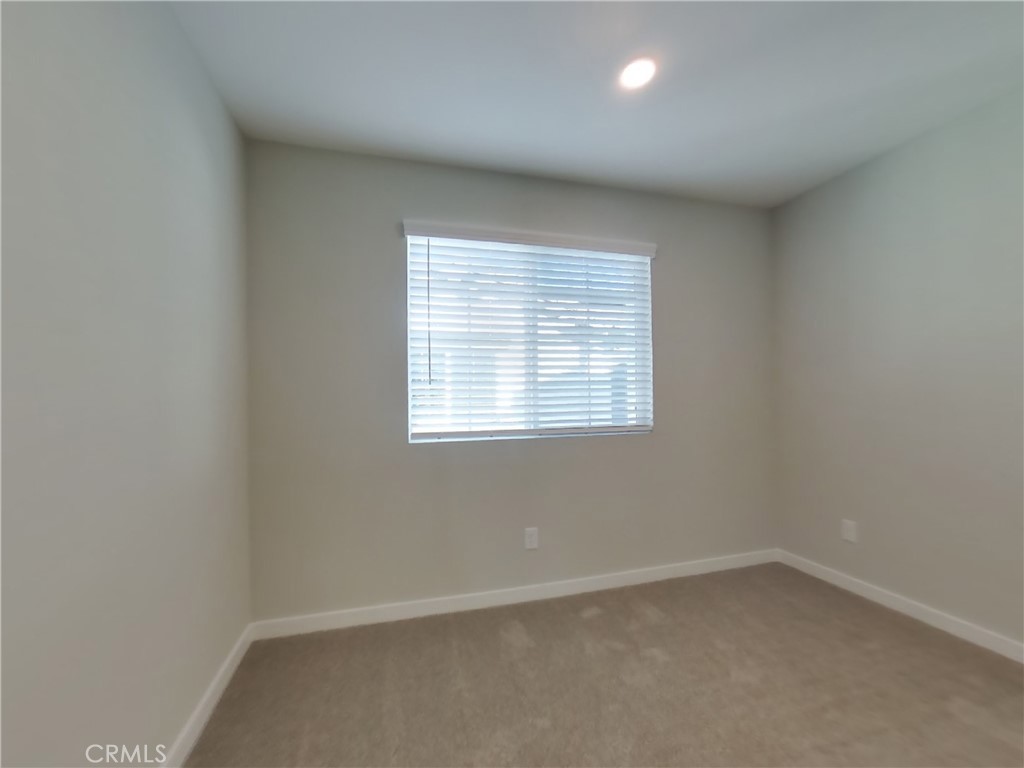 31727 Willowood Way Menifee, CA 92584 - Photo 11 of 31 an empty room with a window