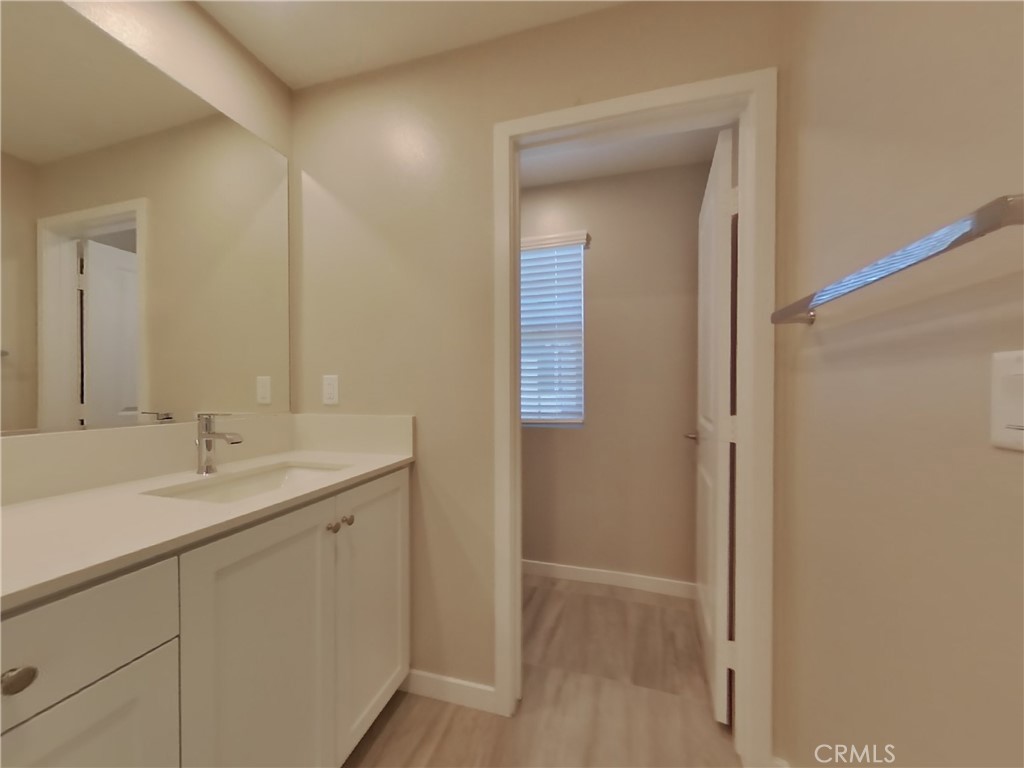 31727 Willowood Way Menifee, CA 92584 - Photo 9 of 31 a bathroom with a sink and a mirror