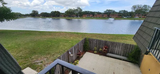 a view of a lake from a balcony