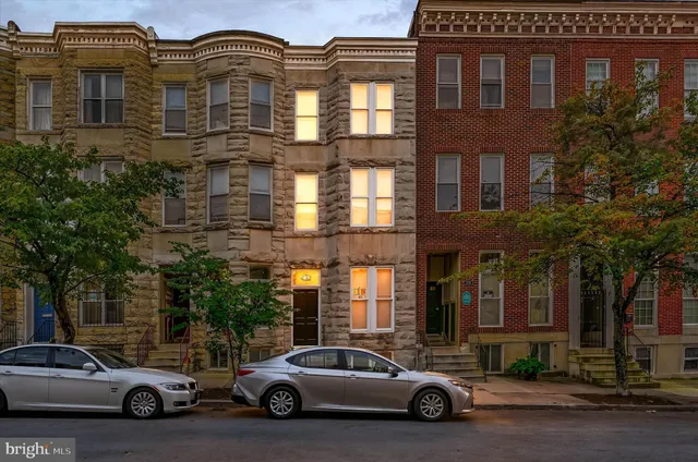 a car parked in front of a building