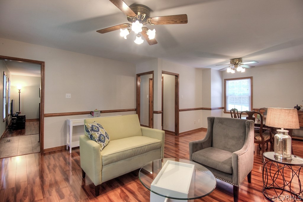 3108 Nahant Road Midlothian, VA 23112 - Photo 7 of 29 a living room with furniture and a chandelier