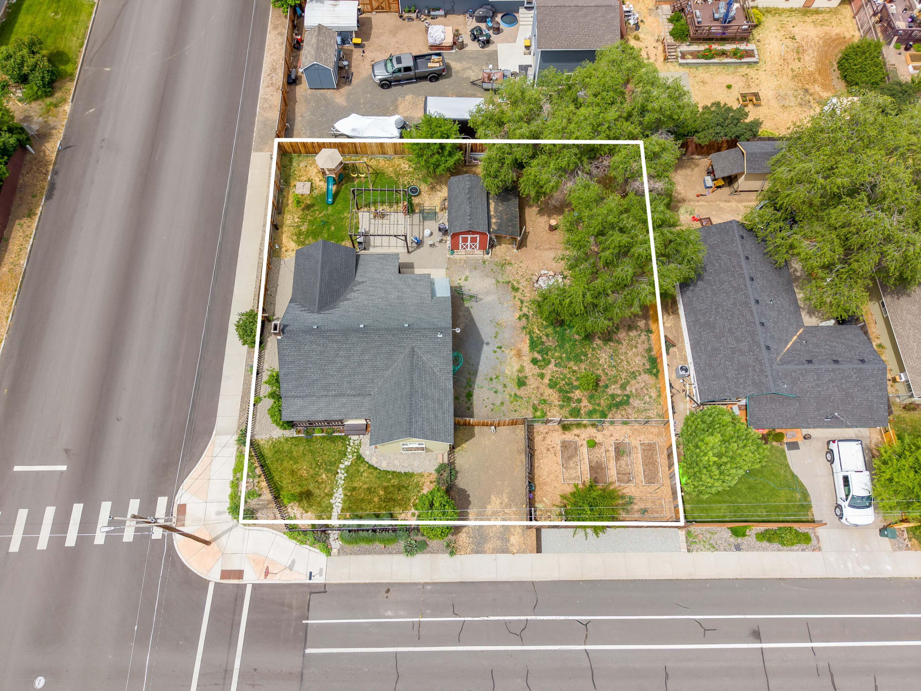 496 Southwest 2nd Street Madras, OR 97741 - Photo 33 of 37 an aerial view of a house with a garden
