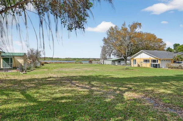 a view of a lake with a houses