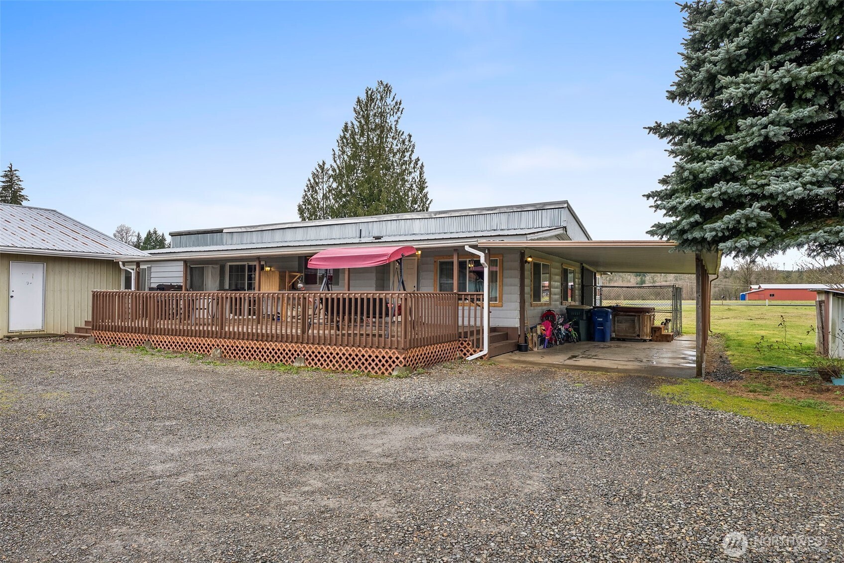 738 Gish Road Onalaska, WA 98570 - Photo 11 of 40 a view of a house with a yard and sitting area