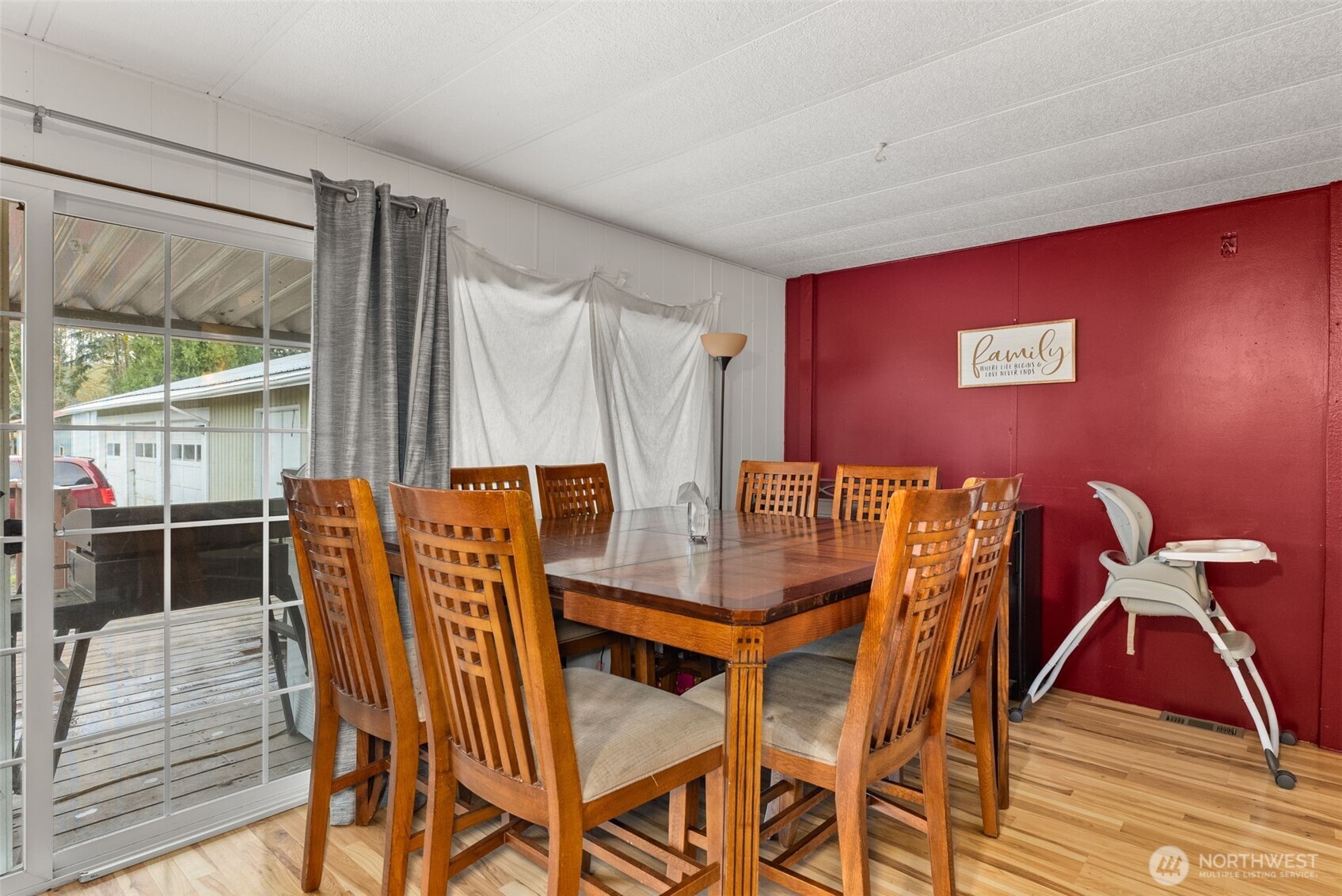 738 Gish Road Onalaska, WA 98570 - Photo 15 of 40 a view of a dining room with furniture and wooden floor