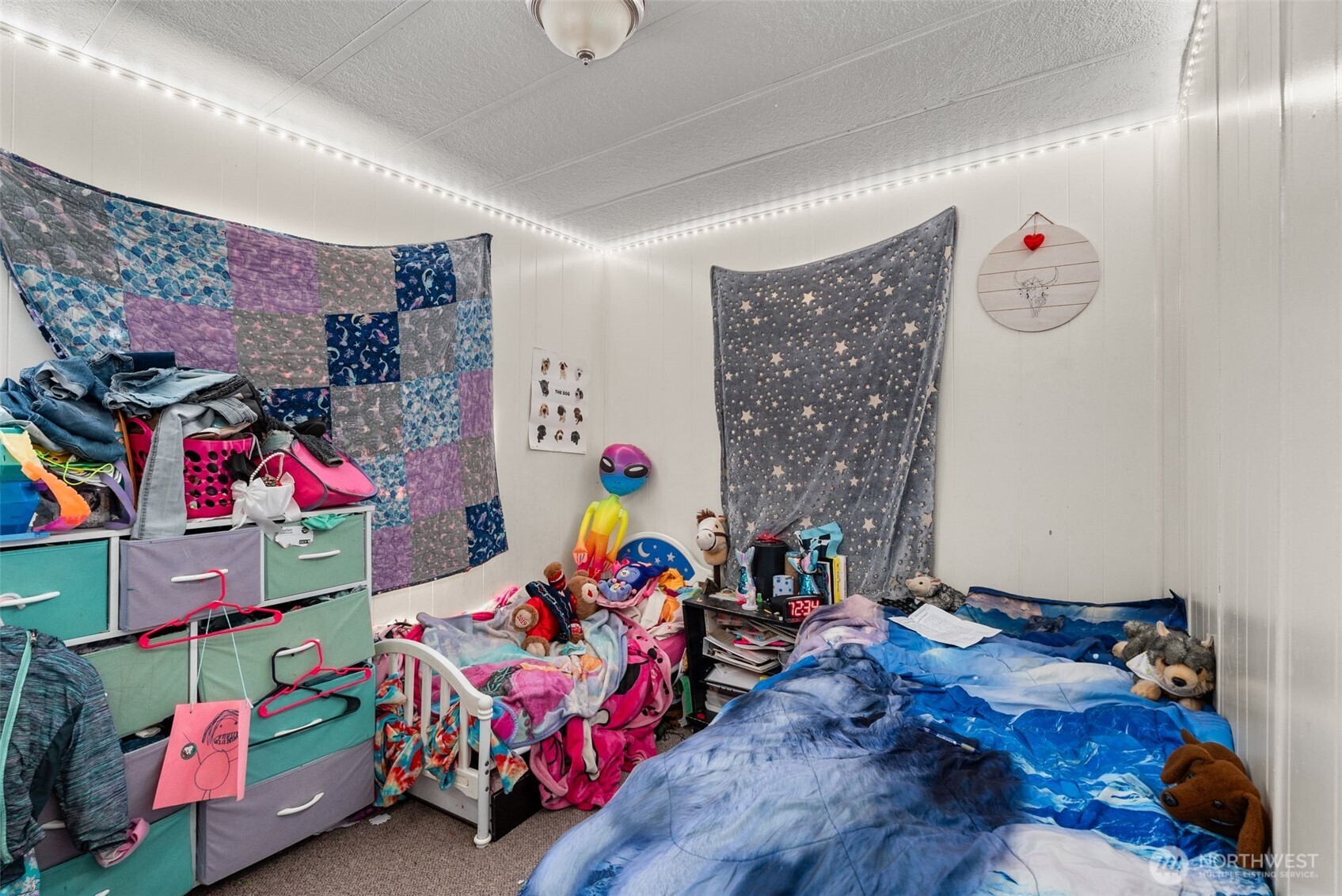 738 Gish Road Onalaska, WA 98570 - Photo 30 of 40 a bedroom with toys and a couch