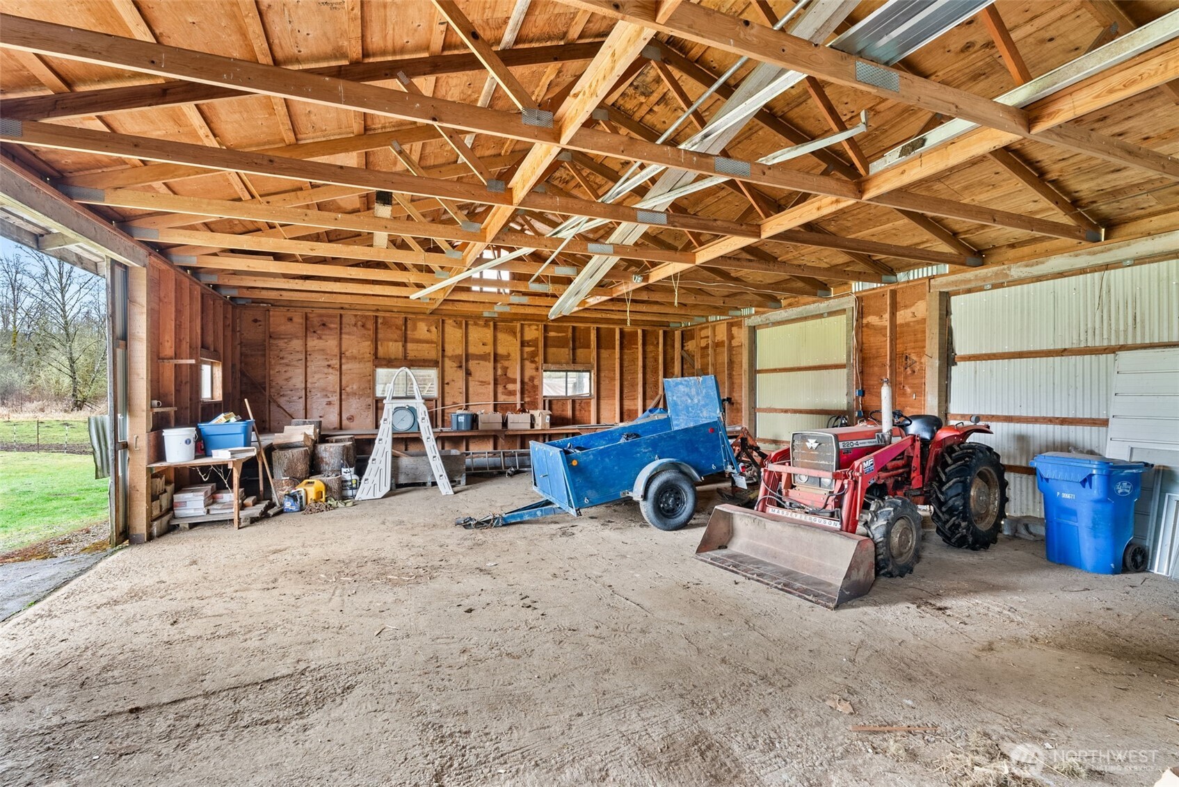738 Gish Road Onalaska, WA 98570 - Photo 35 of 40 a view of a garage with a table and chairs