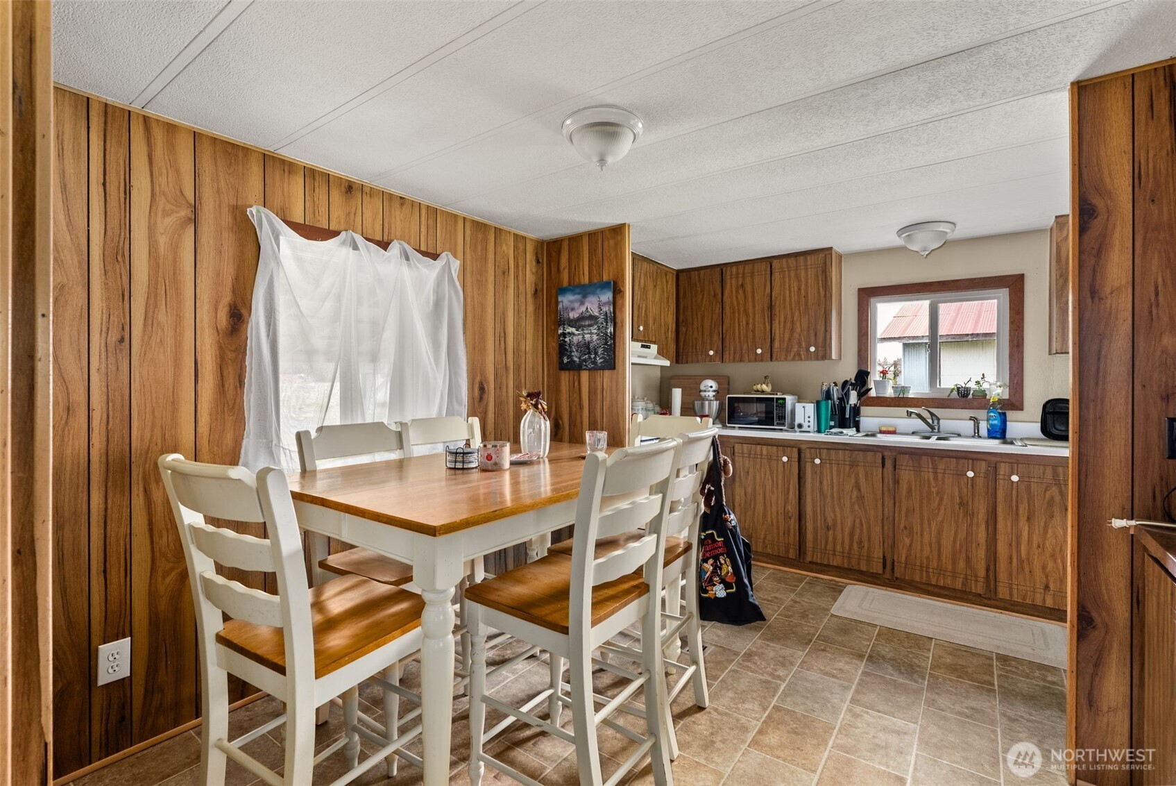 738 Gish Road Onalaska, WA 98570 - Photo 7 of 40 a kitchen with a table and chairs