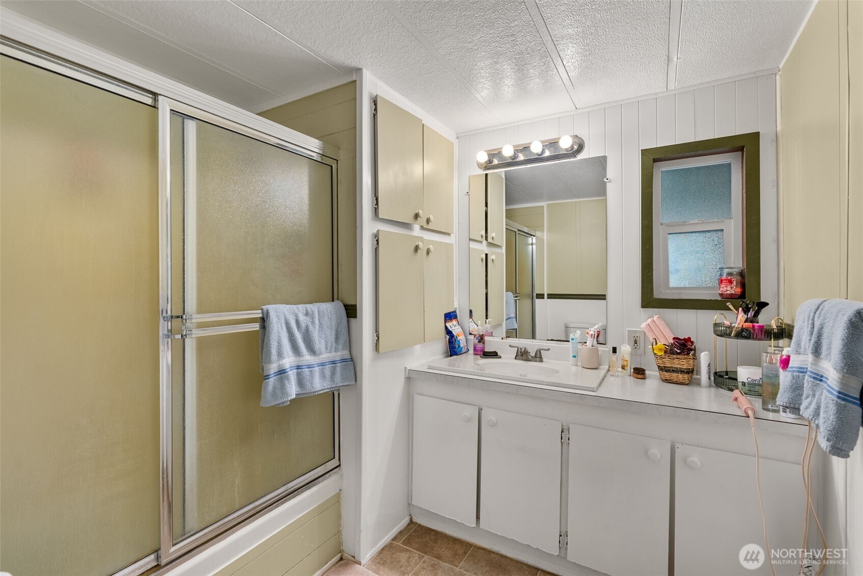 738 Gish Road Onalaska, WA 98570 - Photo 9 of 40 a bathroom with a double vanity sink and mirror