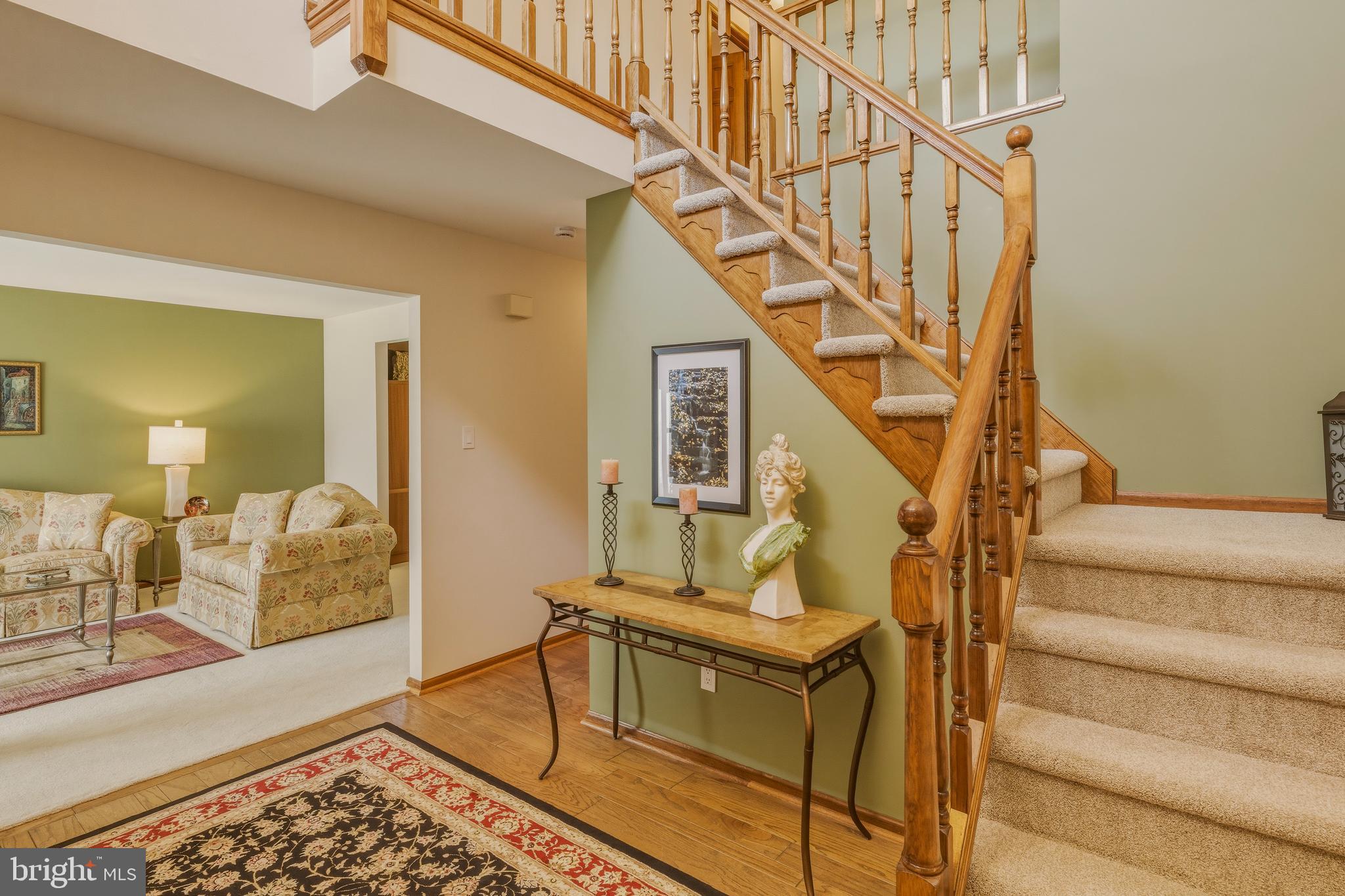 8 Rothschild Court West Deptford, NJ 08096 - Photo 2 of 29 a view of entryway livingroom and hall with wooden floor